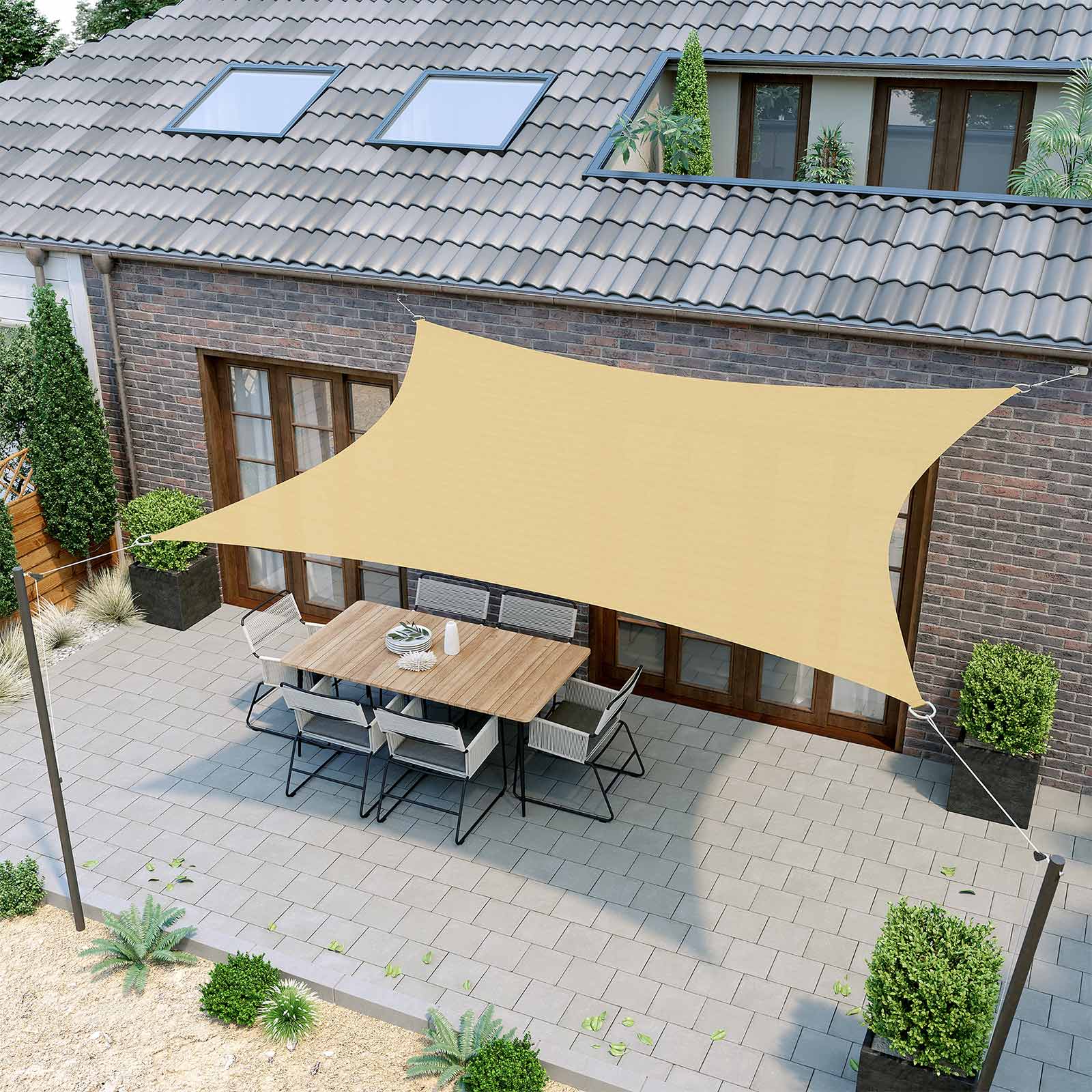 Square residential sun shade sail over patio area.